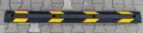 Rubber parking stopper black, with yellow tape